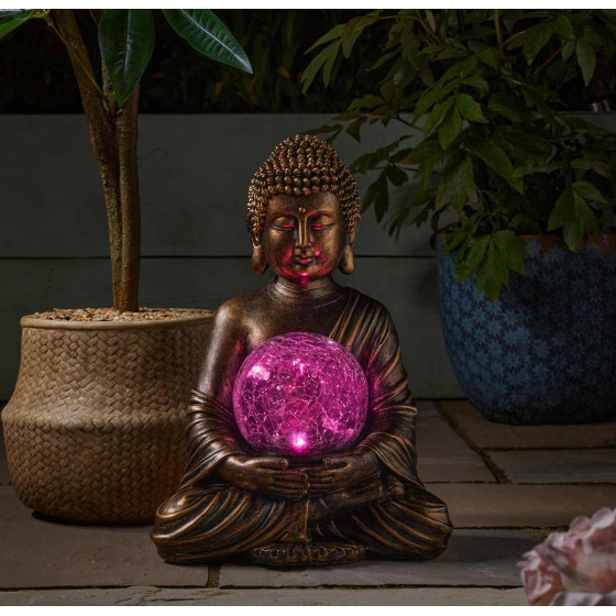 lampe bouddha avec lumière colorée rose